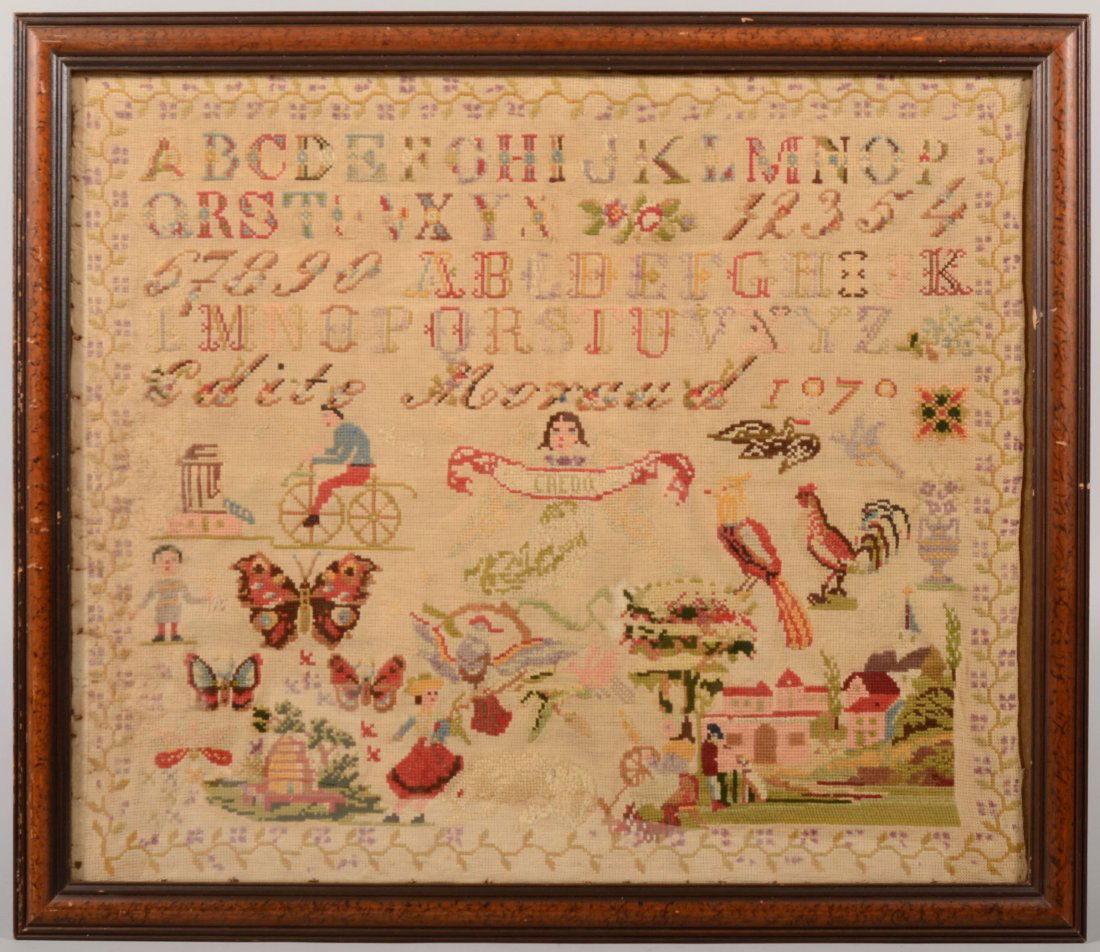 Large Framed Cross Stitched Sampler. Signed and da: Large Framed Cross Stitched Sampler. Signed and dated: "Edite Moraud, 1878." Showing two different alphabets with numbers in top half and multiple polychrome images including: Insects, "bone shaker" b