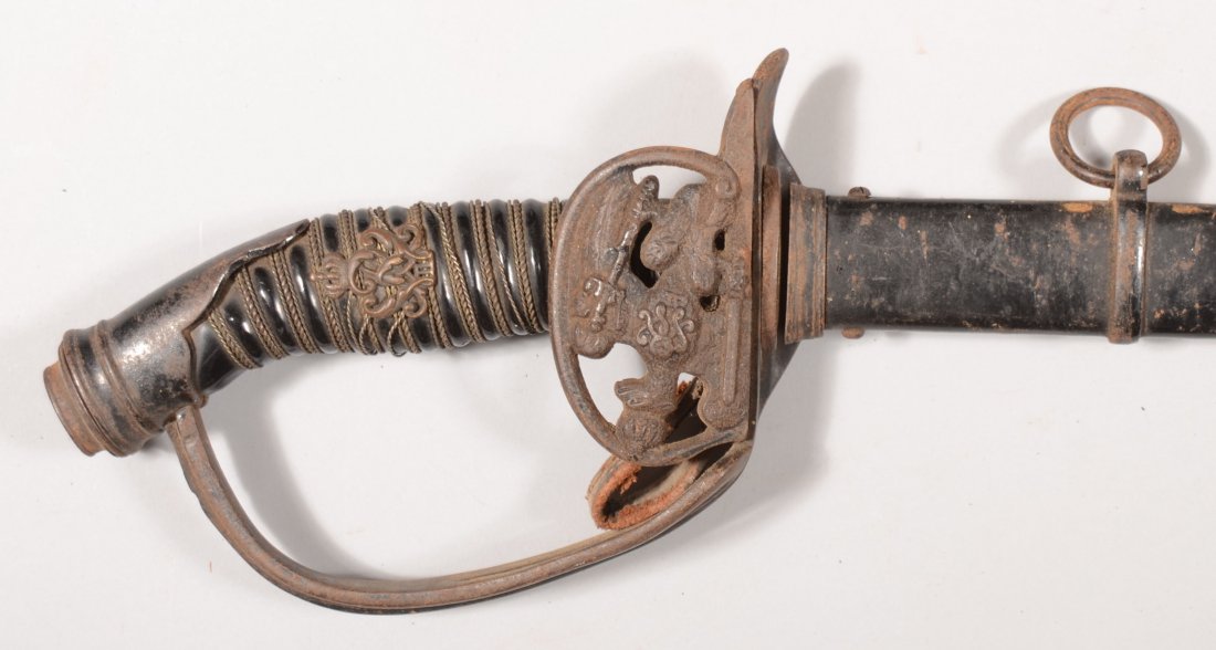 Prussian M1889 Infantry folding guard sword having: Prussian M1889 Infantry folding guard sword having a black enameled scabbard, black enameled iron hilt with pierced guard, black celluloid grip with tripple twisted wire, and a Kaiser Wilhelm II cyphe