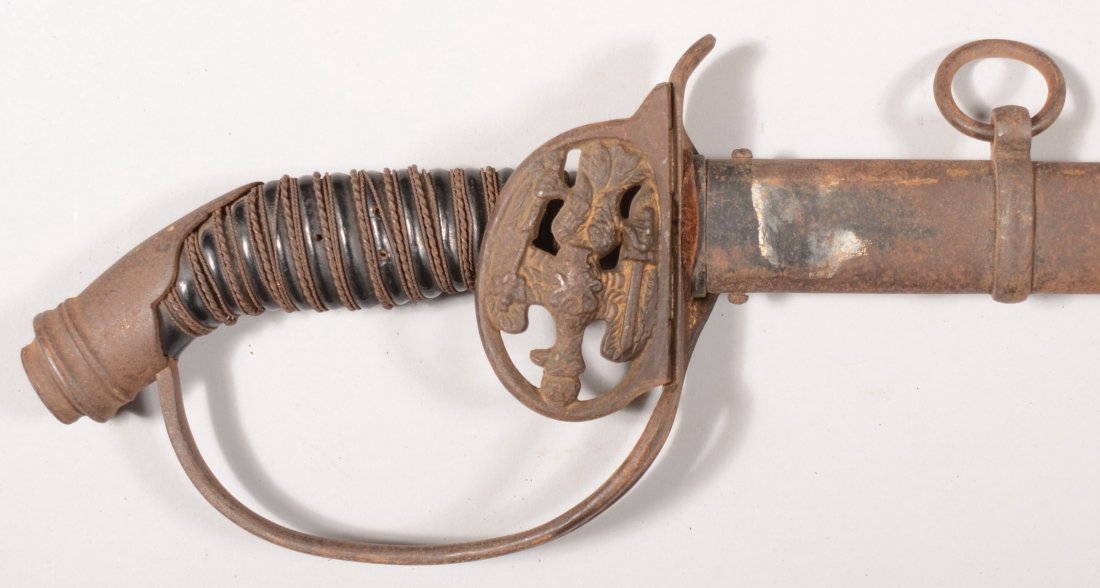Prussian M1889 Infantry folding guard sword having: Prussian M1889 Infantry folding guard sword having a black enameled scabbard, black enameled iron hilt with pierced guard, and a black celluloid grip with tripple twisted wire.
