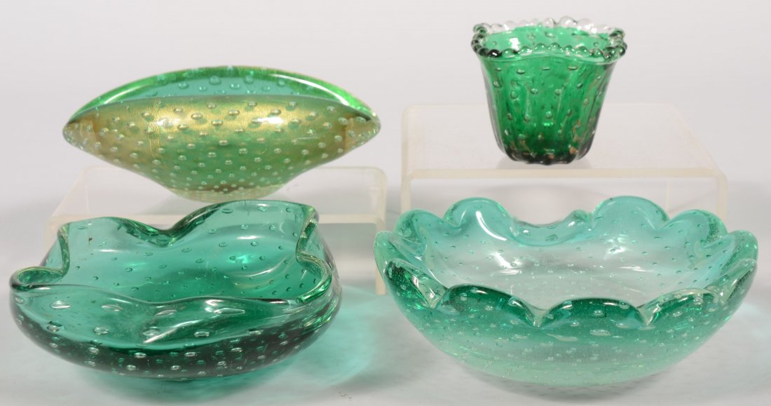 Four Blown Green Glass with Suspended Bubbles Piec: Four Blown Green Glass with Suspended Bubbles Pieces. A four pinched sided bowl, 7"d.; a scalloped rim bowl, 7 3/4"d.; a pulled oval dish, 7 1/2"l.; a reeded side cup with squared and beaded rim, 2 3/