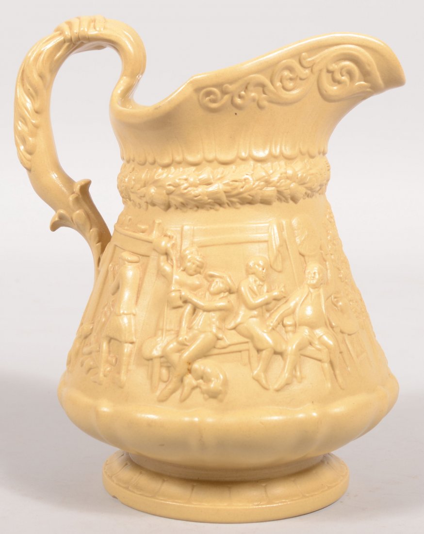 Parianware Pitcher. Buff colored pitcher with reli: Parianware Pitcher. Buff colored pitcher with relief scenes of a tavern with four men drinking on one side and a Scot on horseback being pursued by two "witches" flying after him. Molded loop handle a
