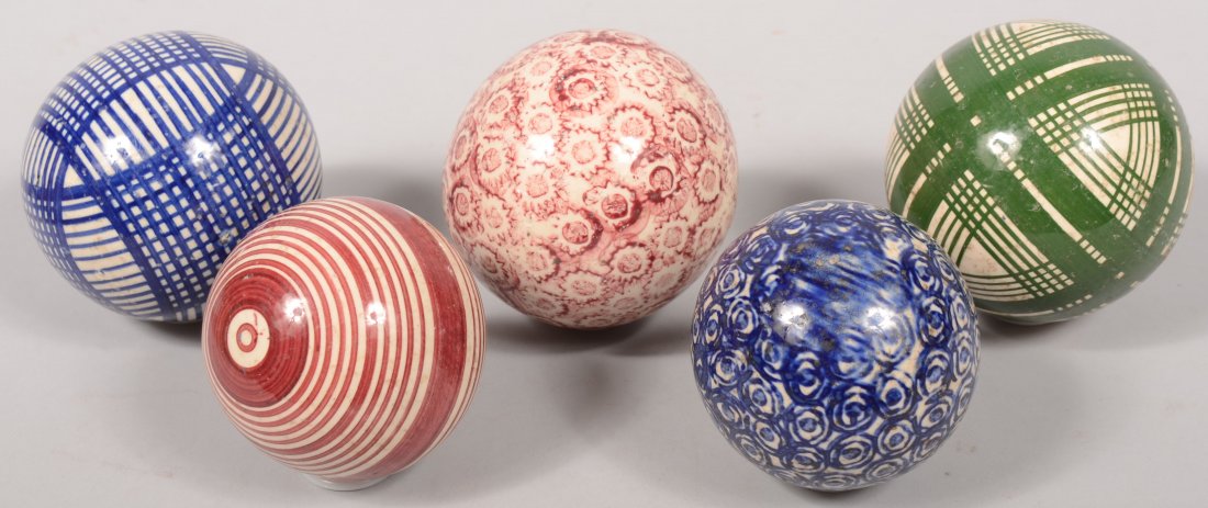 Set of Five Glazed China Carpet Balls. Used for a : Set of Five Glazed China Carpet Balls. Used for a game much like Bocce, kind of a floor billiards without sticks. Blue, red and green colors with line and stamped designs applied. 3 1/4" and 2 3/4" di