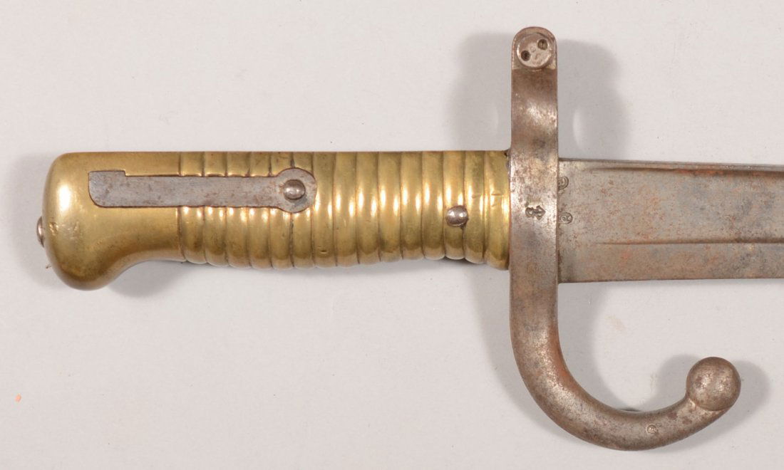 A French 19th Cen. Rifle Bayonet, Brass hilt Iron: A French 19th Cen. Rifle Bayonet, Brass hilt Iron blade and guard. Dated on blade spine: 1878. 27 1/2"l.
