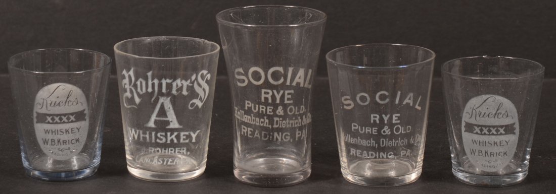 Five Acid Etched Name Brand Colorless Shot Glasses: Five Acid Etched Name Brand Colorless Shot Glasses. A "Rohrer's 'A' Whiskey, J.Rohrer, Lancaster, PA.", 2 3/8"h.; two "Social Rye, Pure & Old, Hollenbach, Dietrich & Co., Reading, PA.", 2 3/8"h. & 3"h