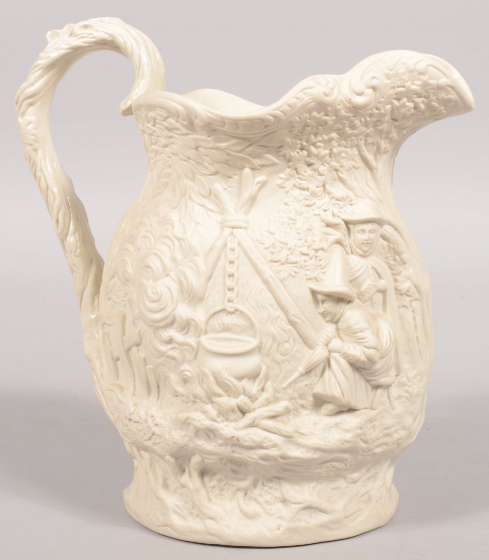 White Parian Pitcher. Relief design on body show a: White Parian Pitcher. Relief design on body show a group of adults with one child camping in the woods. A tent on one side and a cook fire on the other. Vine loop handle. 10 1/2"h.