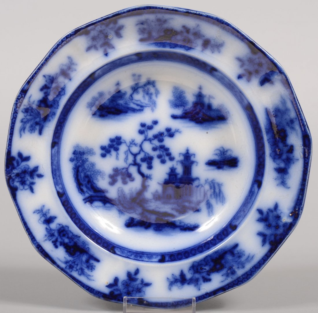 Flow Blue Ironstone Soup Plate. Twelve sided rim.: Flow Blue Ironstone Soup Plate. Twelve sided rim. Reverse marked: "Chapoo, J. Wedgwood." Asian theme design. 8 3/8"dia.
