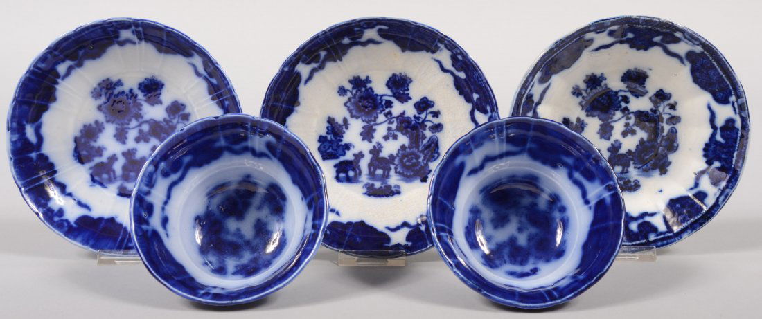 Three Flow Blue Ironstone Saucers and Two Handless: Three Flow Blue Ironstone Saucers and Two Handless Cups. Cups unmarked, but match the pattern of the saucers marked on bottom with English cipher, Cashmere, R&M. Cups and saucers have a scalloped rim