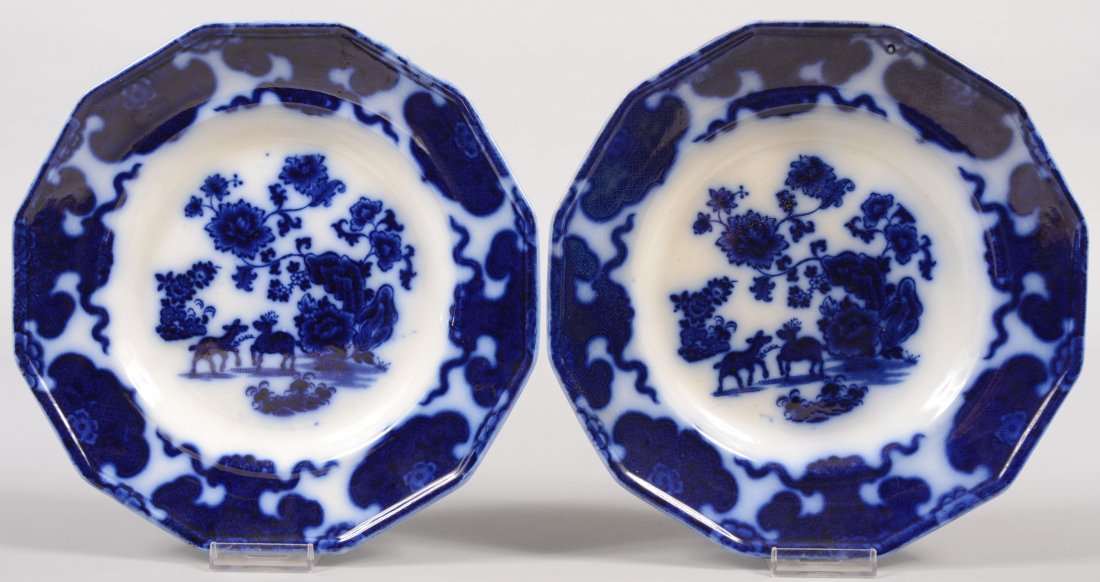 Two Flow Blue Ironstone Plates. Twelve sided rims.: Two Flow Blue Ironstone Plates. Twelve sided rims. Bottoms marked with English patent cipher, Cashmere, F.M. & Co. 10 1/2"dia.