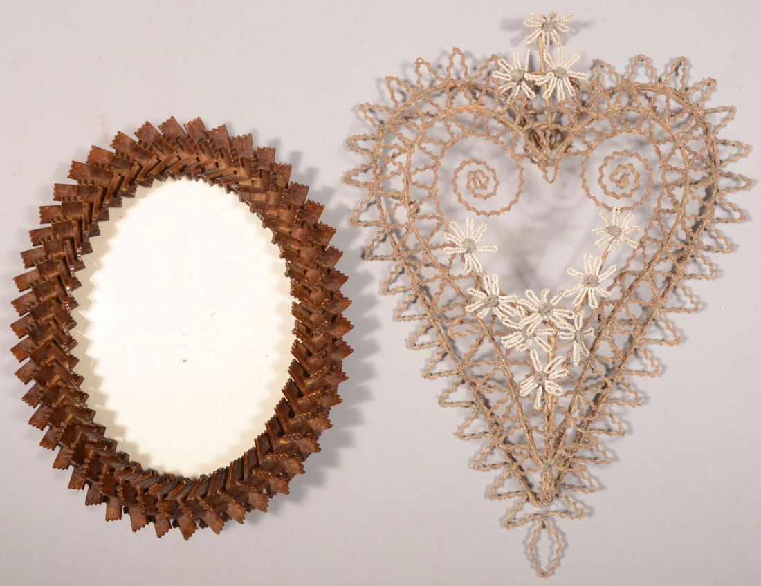 Two Folk Art Pieces. A carved wooden puzzle piece: Two Folk Art Pieces. A carved wooden puzzle piece or "Crown of Thorns" tramp art oval picture frame with glass and backboard. 12 1/2"h. X 10 1/4"w. Along with a beaded wire wall hanging garniture in a