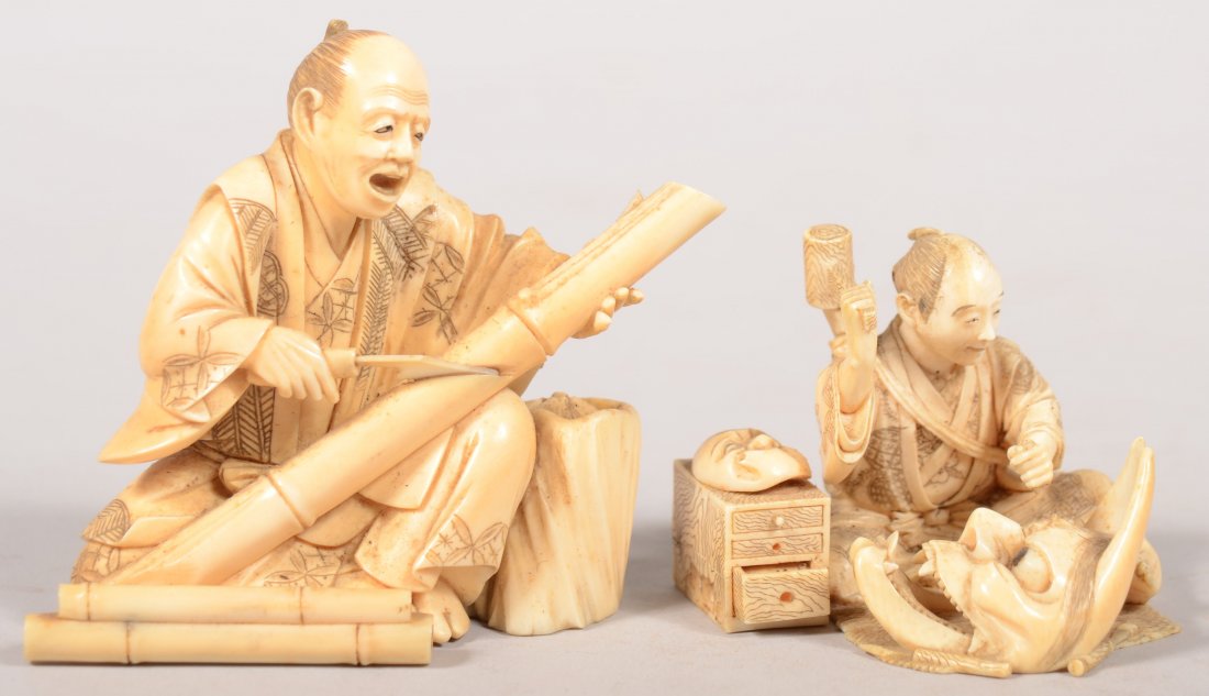 Two Chinese Tradesmen Carved Ivory Models. Both in: Two Chinese Tradesmen Carved Ivory Models. Both in decorated robes. One a bamboo carver with saw and shaving stump. 3"h. X 4"w. Along with a mask carver seated on a mat with hammer and chisel in mid b