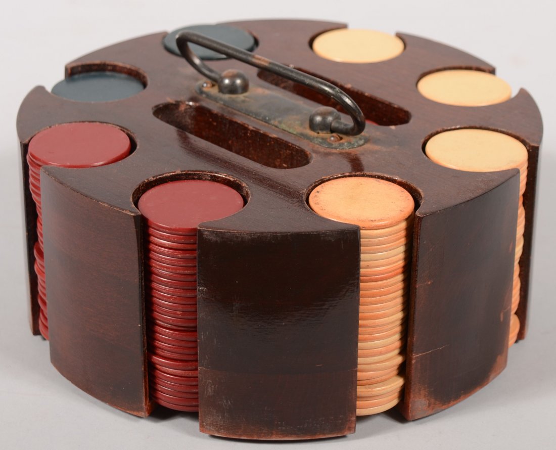 Mahogany Poker Chip Caddy with vintage red, white: Mahogany Poker Chip Caddy with vintage red, white and blue poker chips, folding handle and black pressboard cover. 3 3/4"h. X 8 3/4"dia.