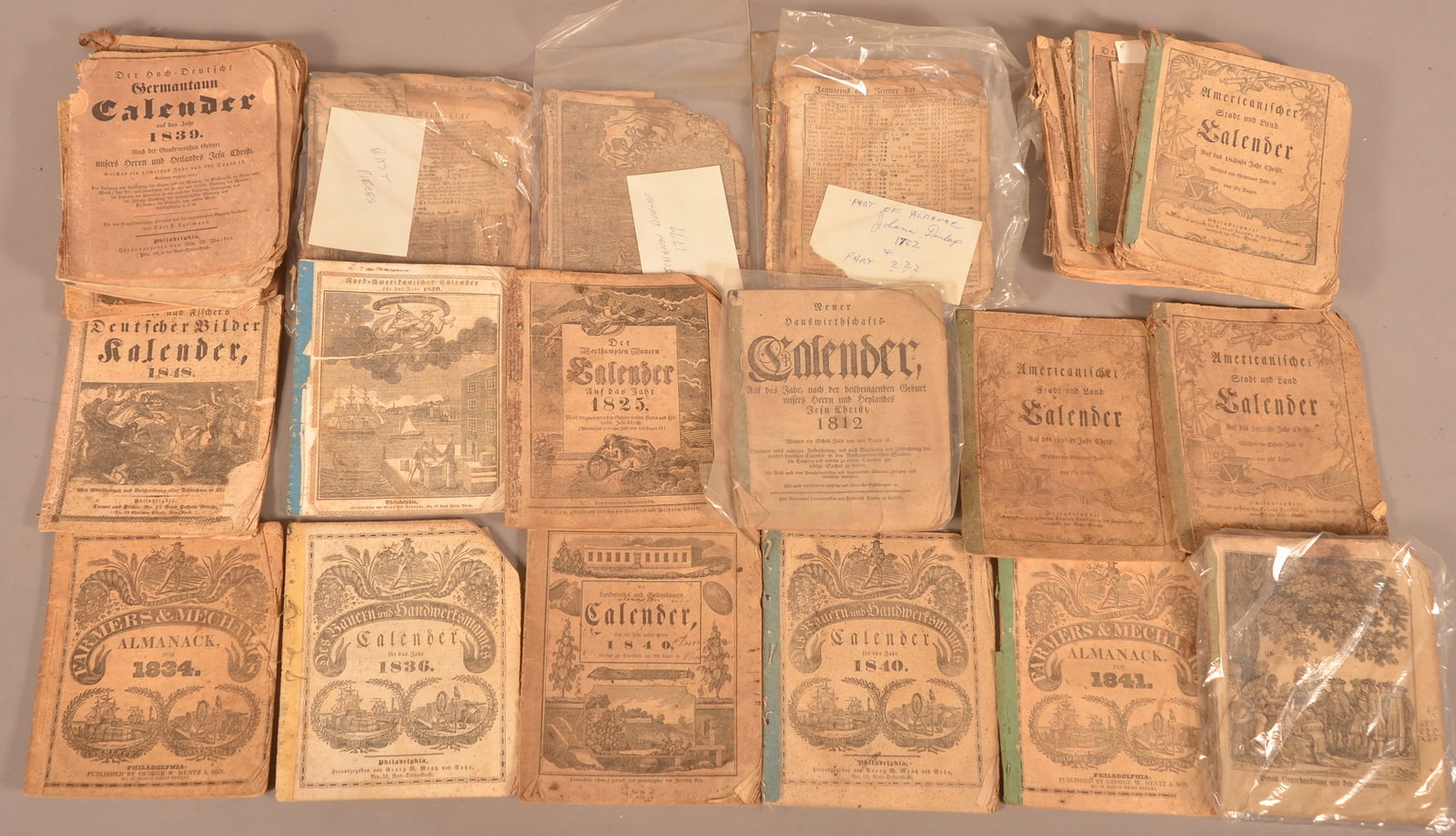 Lot of 35 18th/19th c PA-German Almanacs: A lot of approx. 35 various Penna-German almanacs, most 19th c. but 3 partial/defective 18th c. -- 2 printed by John Dunlap in 1779 & 1782. Condition: Good.