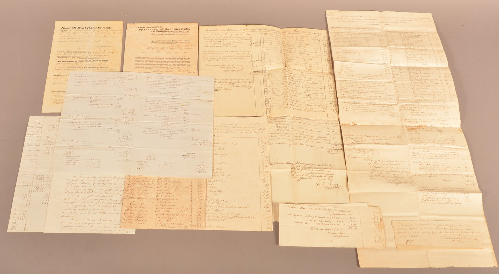 Lot of 19th c Estate Papers Bard Family Lancaster: A lot of estate papers of Mary and Martin Bard of Lancaster. Includes her will, numerous papers with inventory sold at auction, bills, smaller lists of items sold, etc. Also a large 13 x 32" manuscrip