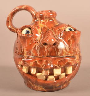 Nolde Forest Pottery Grotesque Face Jug.: Nolde Forest Pottery Grotesque Face Jug. Signed Wesley Muckey "Morty", dated September 2012. 5"h.