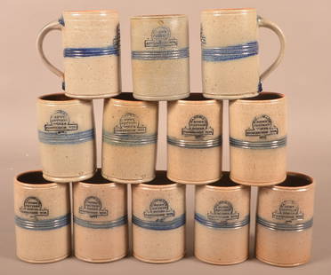 Set of 12 Rowe Stoneware Pottery Mugs.: Set of 12 Rowe Stoneware Pottery Mugs. Handmade in Cambridge, WI, having an Albany slip-glazed interior. 5-1/4"h.