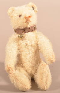 Small Steiff White Mohair Jointed-Body Teddy Bear.: Small Vintage Steiff White Mohair Jointed-Body Teddy Bear. With button in ear, brown and black glass eyes. 7-1/2"h.