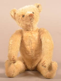 Antiq. Steiff Ivory-Colored Mohair Humpback Teddy Bear.: Antique Steiff Ivory-Colored Mohair Humpback Teddy Bear. With Steiff button in ear, black shoe button eyes, fully jointed, felt pads. 10"h.