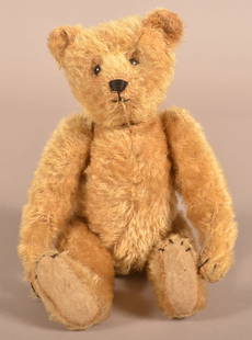 Antique Steiff Blonde Mohair Teddy Bear.: Antique Steiff Blonde Mohair Teddy Bear. Unsigned, circa 1908-1909. 5-way jointed with shoe button eyes. 12"h.