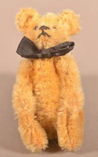 Antique Steiff Mohair Miniature Teddy Bear.: Antique German Mohair Miniature Teddy Bear. Unsigned, attributed to Steiff. 5-way jointed with shoe button eyes and upturned feet. 3-1/2"h.