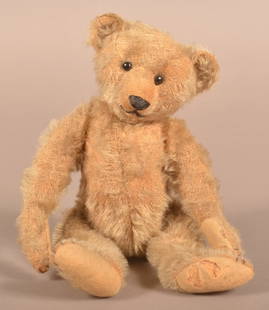 Antique German Blonde Mohair Teddy Bear.: Antique German Blonde Mohair Teddy Bear. Attributed to Steiff, early 20th century. 5-way jointed with shoe button eyes. 11"h.