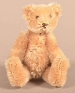 Vintage German Miniature Tan Mohair Teddy Bear.: Vintage German Miniature Tan Mohair Teddy Bear. Attributed to Steiff, circa 1950's. 5-way jointed with shoe button eyes and upturned feet. 3-1/2"h.
