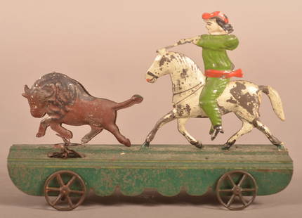 Fallows Painted Tin Buffalo Hunter Pull Toy.: Fallows Painted Tin Buffalo Hunter Pull Toy. Pat. Aug 3, 1886. 6"h. x 9"l.