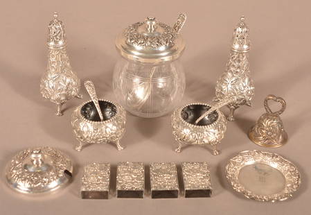 Various S. Kirk & Son "Repousse" Sterling Silver.: Various S. Kirk & Son "Repousse" Sterling Silver. Including footed salt and peppers, hand bell, matchbox covers, butter pat, etc. Pepper pots 9"l. Approx. 20.00 ozt. weighable.