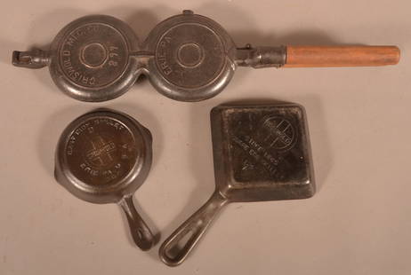 Three Pieces of Griswold Cast Iron Cookware.: Three Pieces of Griswold Cast Iron Cookware. No. 0 skillet, 129a square egg skillet, and 899 double waffle iron.