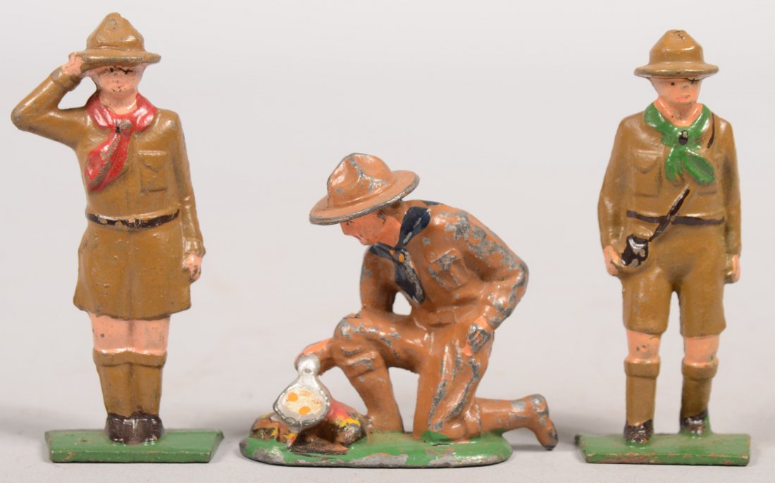 Three Mixed Boy Scouts. A crouching Barclay egg fr: Three Mixed Boy Scouts. A crouching Barclay egg fryer with fire in pot metal, two Grey Iron cast iron figures, ne walking with camera, the other saluting. 3 1/4"h. scale.