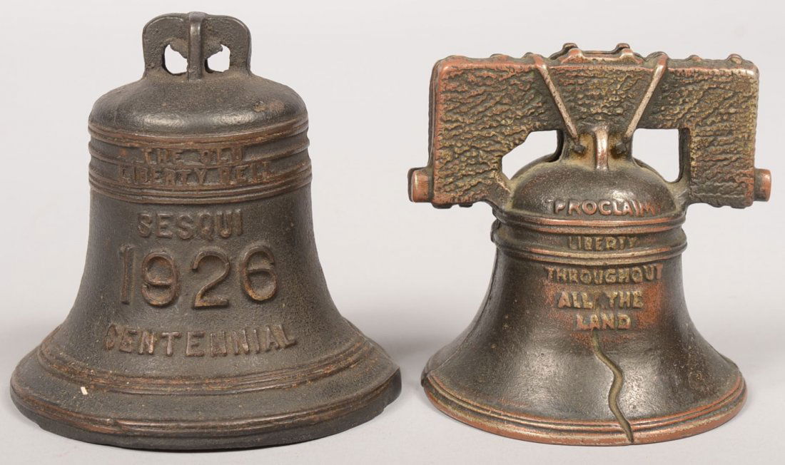 Two Liberty Bell Cast Iron Still Banks. A "1776/19: Two Liberty Bell Cast Iron Still Banks. A "1776/1926 Sesquicentennial Bell bank. Produced by Grey Iron Co., 3 3/4"h. X 4"dia. Together with a bronzed liberty Bell with yoke produced by Arcade. 3 1/2"h
