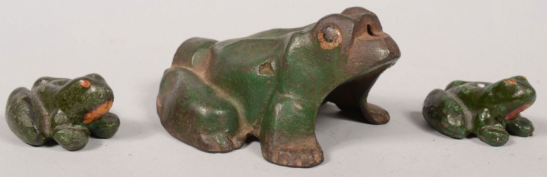 Three Cast iron Frogs. Larger, in green paint, sha: Three Cast iron Frogs. Larger, in green paint, shaped as a water sprinkler with hose attachment at rear. Marked into underside: "Grey Iron Casting Company, Mount Joy, PA." 5 1/4"l. The other two piece