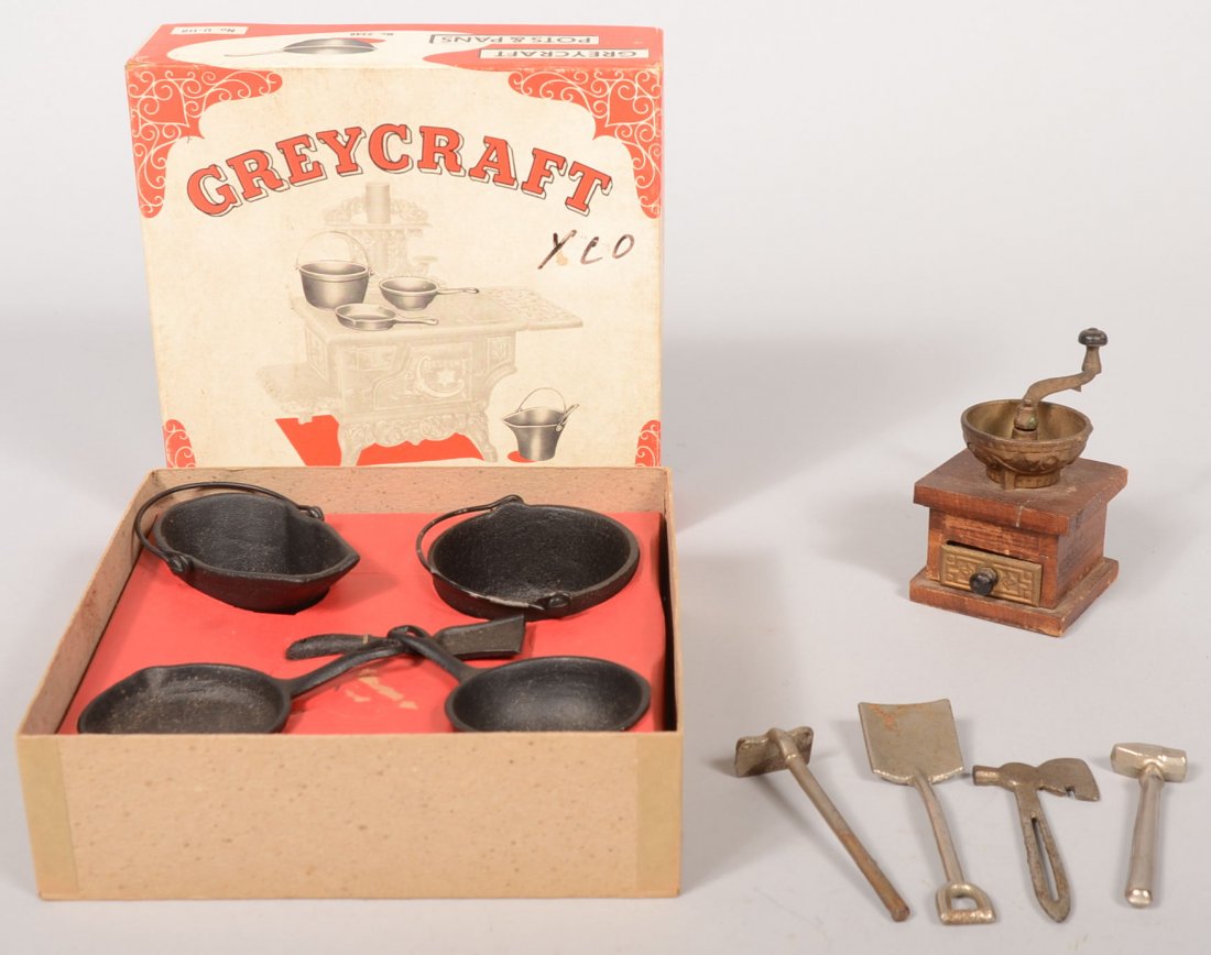 Cast Iron Kitchen Utensils. A five piece set of po: Cast Iron Kitchen Utensils. A five piece set of pots and pans, a coal scuttle and shovel manufactured by Grey Iron Casting Co., Mount Joy, PA. 3"dia. each. Along with four nickel plated tools: a shove