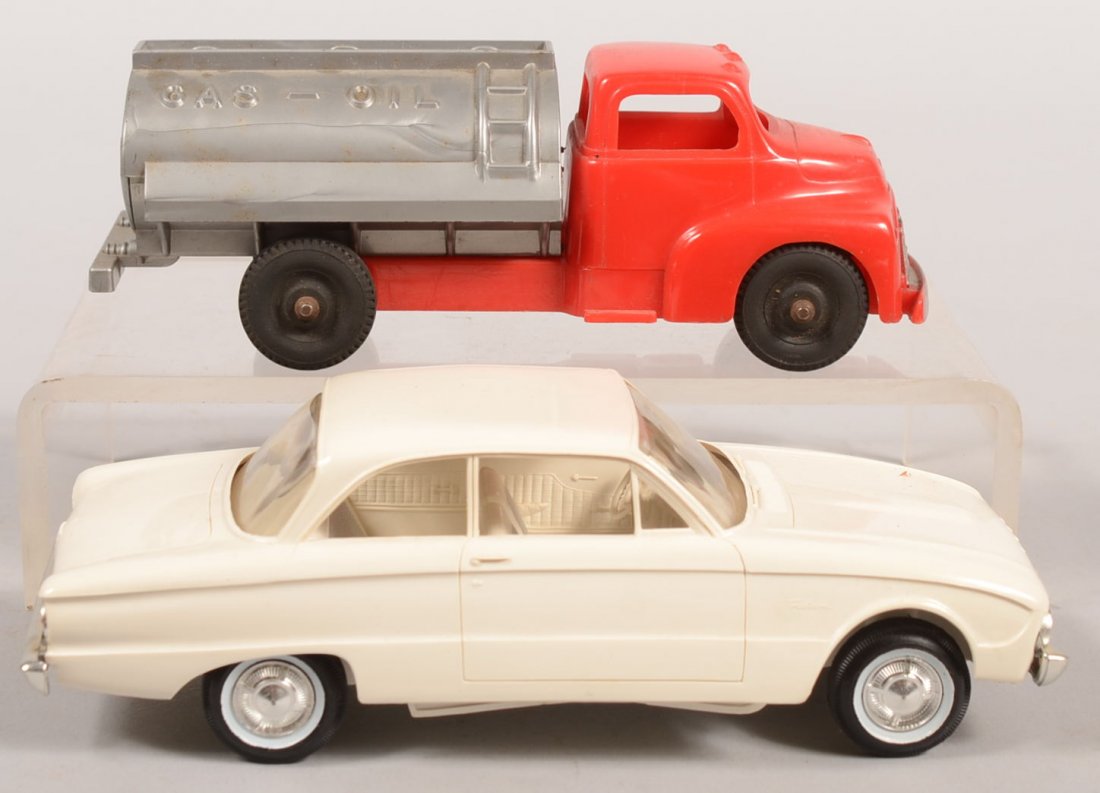 Hubley Kiddie Toy Tank Truck with a 1960 Ford Prom: Hubley Kiddie Toy Tank Truck with a 1960 Ford Promotional Car. Die molded plastic bodies on black rubber wheels. Tank truck red and gray with sliver painted grille, 6 1/2"l. White Ford Falcon two door