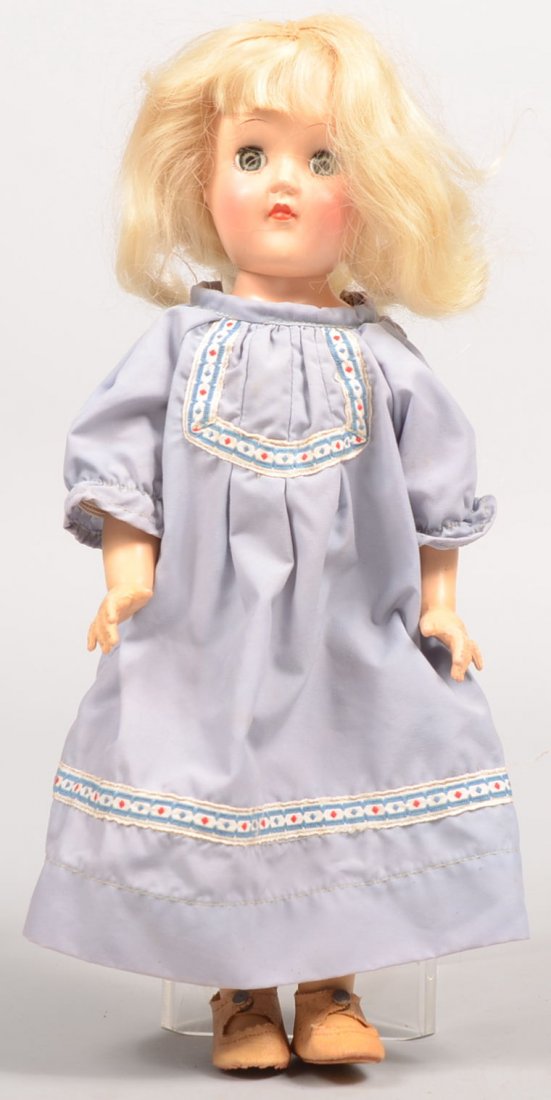 Ideal Doll P-90. Platinum blonde hair, sleep eyes,: Ideal Doll P-90. Platinum blonde hair, sleep eyes, jointed shoulders and hips. Wearing a blue sack dress with applied trim. 14"h.