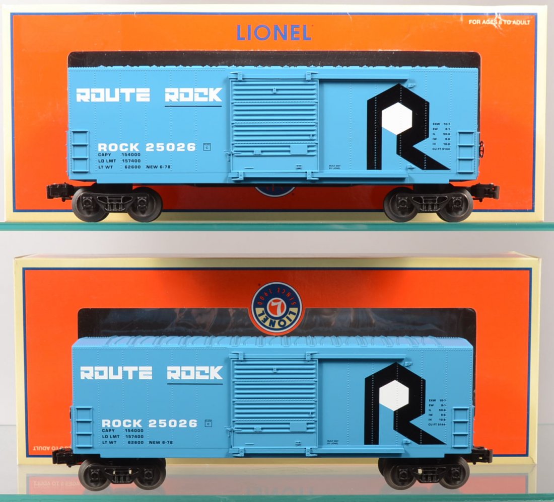 Two Lionel Route Rock Hi-Cube Box Cars, 25026, blu: Two Lionel Route Rock Hi-Cube Box Cars, 25026, blue with white lettering and having original boxes.