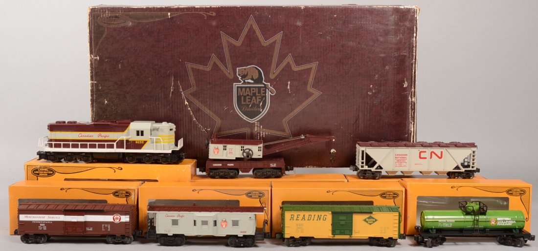 Lionel "Maple Leaf Limited" Toy Train. Diesel Loco: Lionel "Maple Leaf Limited" Toy Train. Diesel Locomotive and six cars. Canadian Pacific SD-24 Diesel, 8152, in maroon, gray, red, yellow and white; brown and gray CP Crane Car, 6508; green British Col