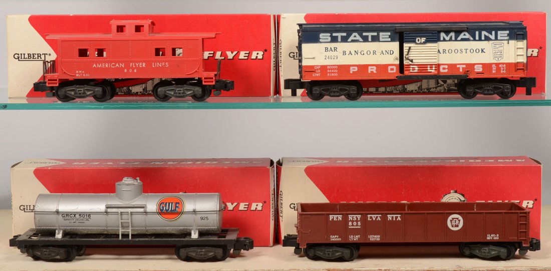 Four American Flyer Rail Cars with Boxes. #925 Gul: Four American Flyer Rail Cars with Boxes. #925 Gulf single dome Tank car; #805 PRR Gondola; #24209 State of Maine Boxcar; #806 AFL red Caboose. All with knuckle couplers.