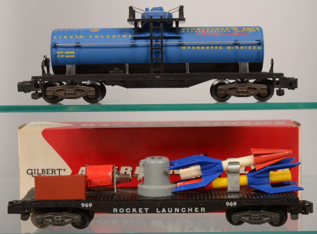 Two American Flyer Specialty Model Railroad Cars. : Two American Flyer Specialty Model Railroad Cars. #969 Rocket Launcher flat car with two rockets. Along with a blue Pennsylvania Salt Manufacturing Company single dome Tank car. Rocket launcher comes 