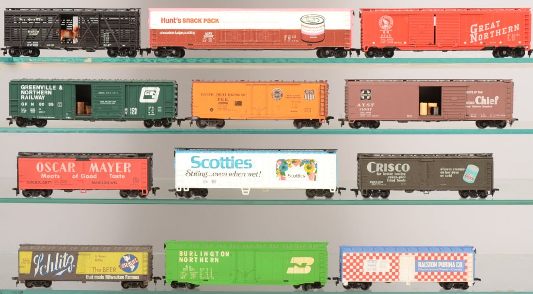 Mixed Group of Twelve HO Model Railroad Boxcars. T: Mixed Group of Twelve HO Model Railroad Boxcars. TYCO made: 201607 ACFX, Hunt's Snack Pack with pink roof; green 100024 Burlington Northern; 93391 U.R.T.X. Schlitz Beer; 4554 M.R.S. Ralston Purina Co.