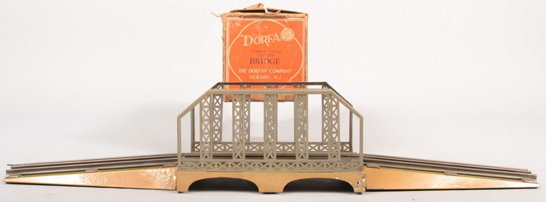 Dorfan "O" Gauge Electric Metal Girder Train Bridg: Dorfan "O" Gauge Electric Metal Girder Train Bridge. Lionel type three rail track on bridge deck and two incline ramps. All in original box.