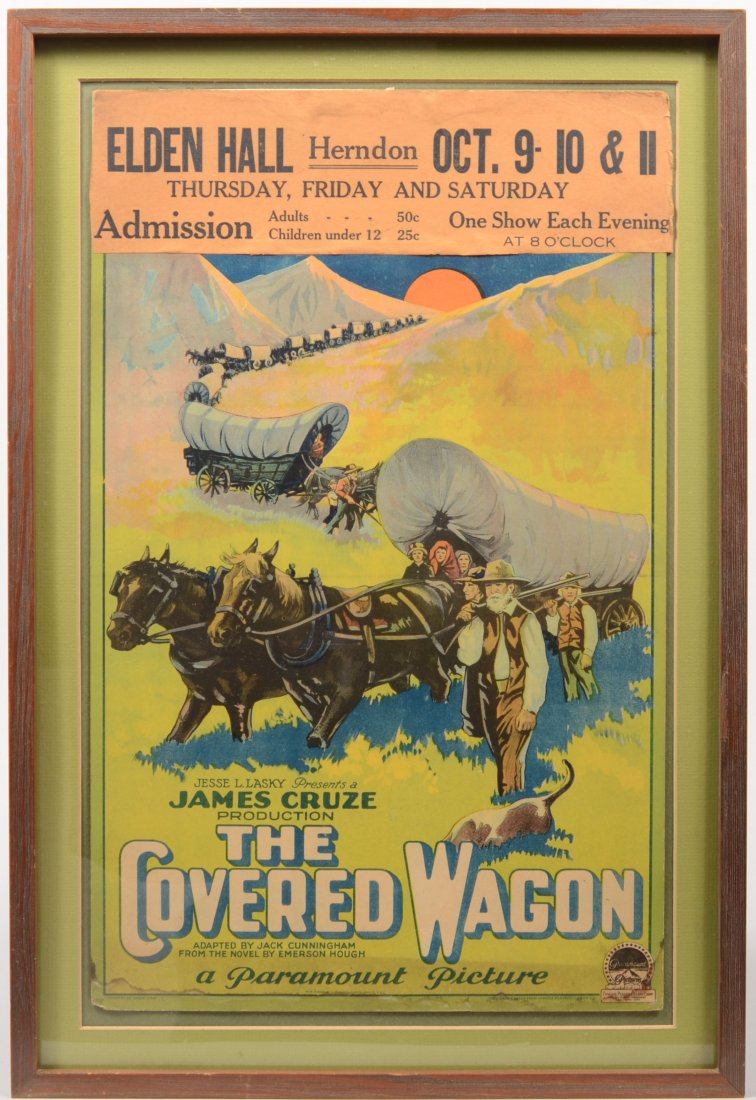Color Movie Card for "The Covered Wagon" by Paramoun: Color Movie Card for "The Covered Wagon" by Paramount Pictures. Produced by James Cruze. Header for movie house: "Elden Hall, Herndon" (Virginia). Floated in a brown wood frame. Card: 21"h. X 13"w. an
