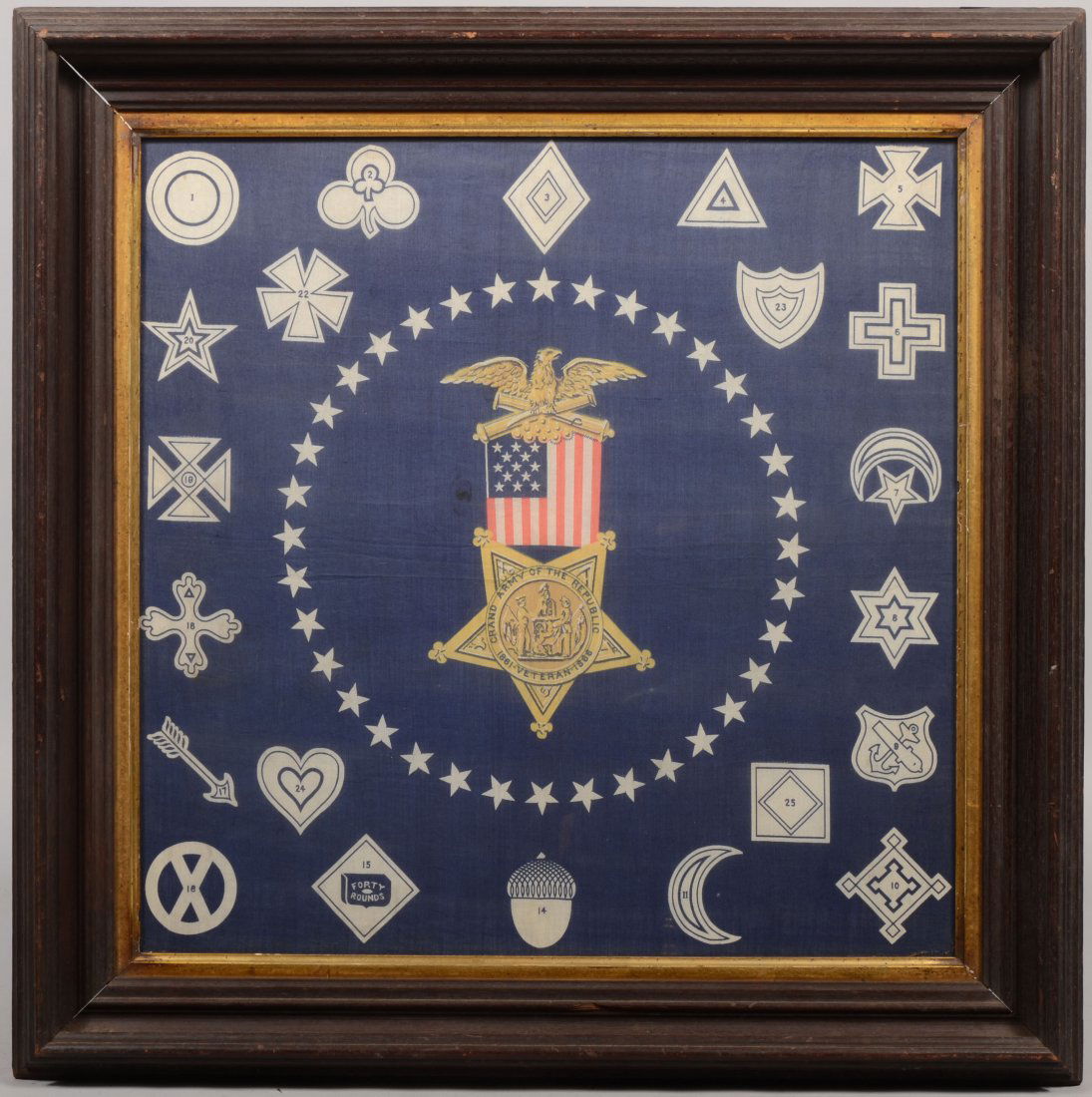 Printed GAR Fabric Kerchief of Union Corps Badges.: Printed GAR Fabric Kerchief of Union Corps Badges. Blue ground with white symbols and a colored GAR ribbon in a circle of stars at center. Mounted in a period deep molded walnut frame. 19 1/2"h. X 19