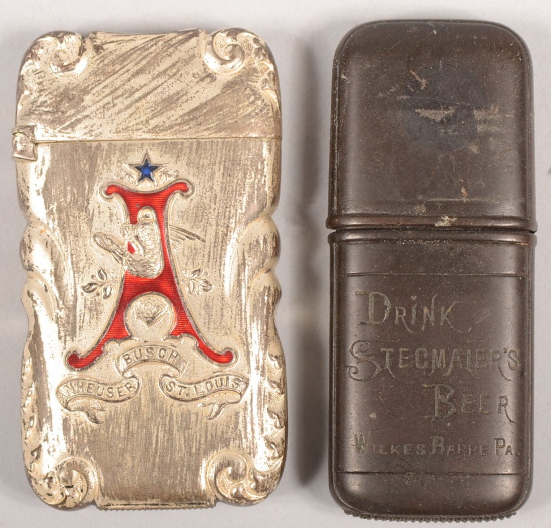 Two Beer Advertising Match Safes. A two piece gutta: Two Beer Advertising Match Safes. A two piece gutta percha safe marked: "Drink Stegmaier's Beer. Wilkes Barre, PA." 2 3/4"l. Along with a German silver safe with spring hinged lid, embossed designs an