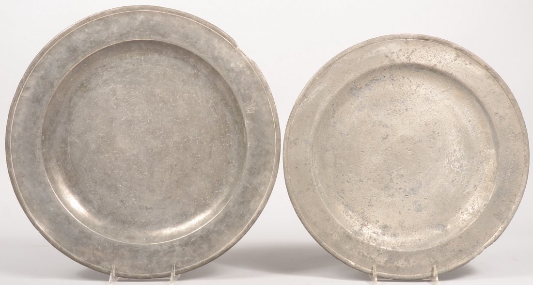 Two Large Pewter Chargers. One with slight molded r: Two Large Pewter Chargers. One with slight molded rim and a Tudor Rose touch mark on back. Unidentified. 15"dia. Along with another charger with a incised line rim and a "London" on a ribbon mark vers