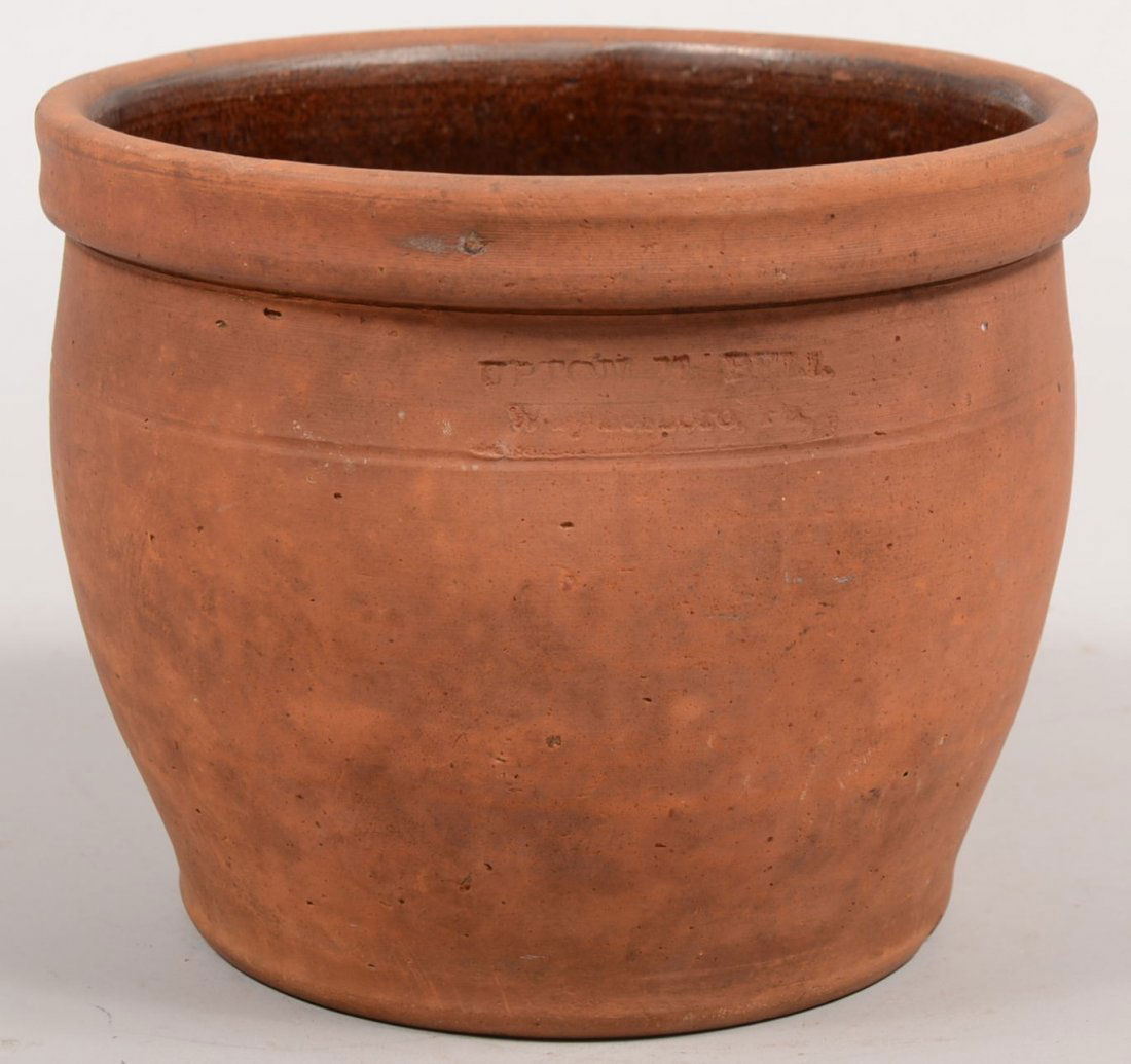 Collared Redware Crock Stamped Upton M. Bell. Wide: Collared Redware Crock Stamped Upton M. Bell. Wide ovoid body with molded collar. Stamped under collar: "Upton M. Bell, Waynesboro, Pa." Salt glazed interior. 6 7/8"h. X 8 1/2"dia. Condition: Good, no