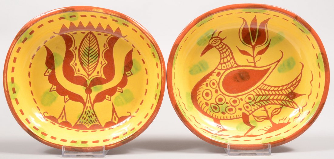 Two James Seagraves Initialed Oblong Redware Dishe: Two James Seagraves Initialed Oblong Redware Dishes. Both with yellow slip and incised decoration. One of a large tulip and the other of a bird with tulip. 1 1/2"h. X 7 5/8"w. Condition: Good, no dama