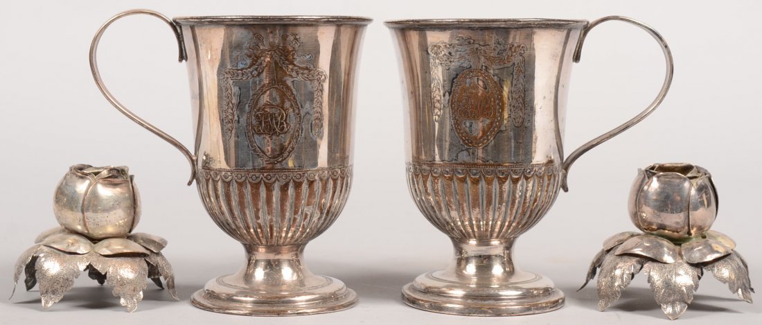 Four Silver on Copper Pieces. Two footed mugs with: Four Silver on Copper Pieces. Two footed mugs with applied loop handles, gadrooned bottoms and raised circular foot with swags and wreathes incised into cup, 5 1/2"h. Along with a pair of rose bud for