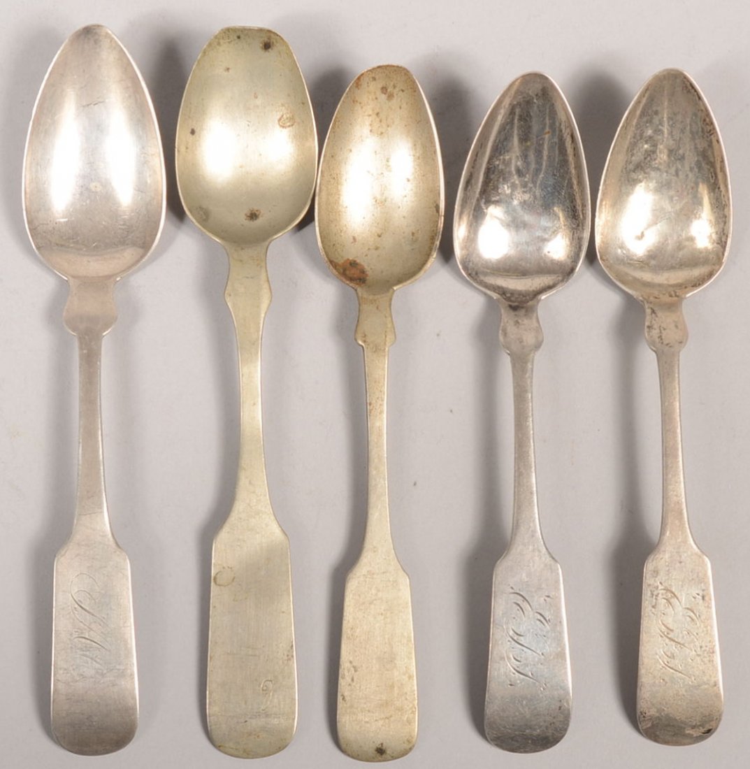 Five Silver Teaspoons with English Hallmarks. Thre: Five Silver Teaspoons with English Hallmarks. Three "D" dated 1799 with London marks. Two "Henry Evans" and one "G.W. King", 5 1/4"l. Of the other two, one marked: "Yates". 5 1/2"l. and 6"l. Total wei