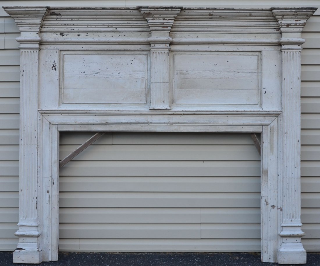 19th Century Wood Fireplace Surround with Double O: 19th Century Wood Fireplace Surround with Double Over Panels. Two fluted side columns and a half length center column, reed outlined double flat over panels with a triple break cornice molding and rel