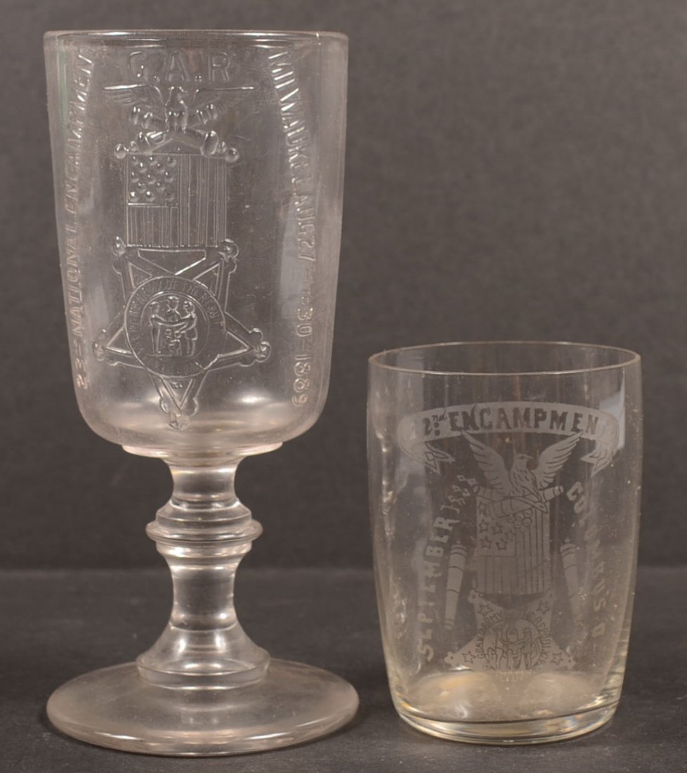 Two Glass GAR Drinking Vessels for 22nd & 23rd Reu: Two Glass GAR Drinking Vessels for 22nd & 23rd Reunions. A clear barrel shaped glass etched with "22nd Encampment, Sept. 1888, Columbus, O." 3 5/8"h. Along with a colorless pressed glass goblet marked